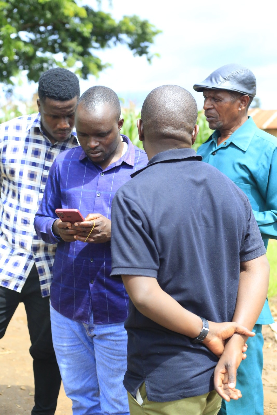 AGnimble field team collecting farm data with smartphones at origin